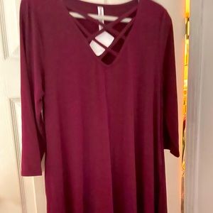 Cute red 3/4 dress with intricate neckline. Burgundy/cranberry color w/ pockets